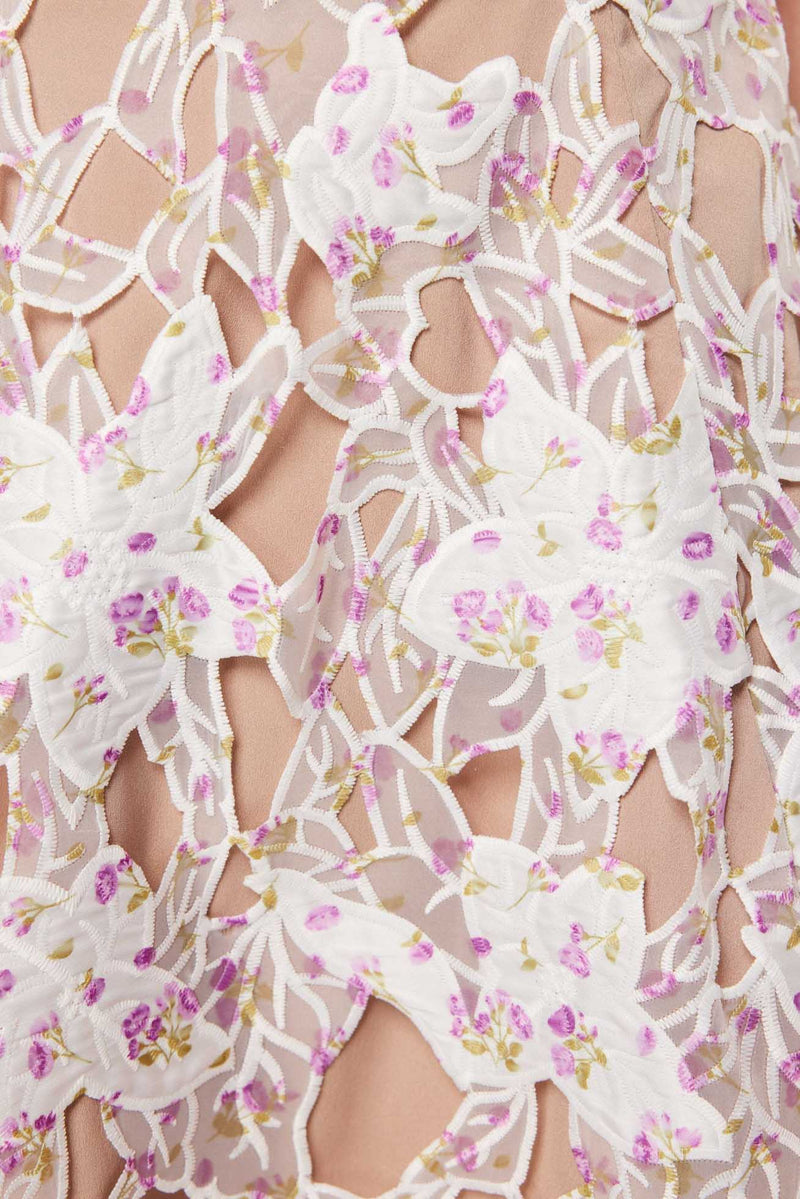 Blonde model wearing the Connection Maxi Gown In Purple detail shot