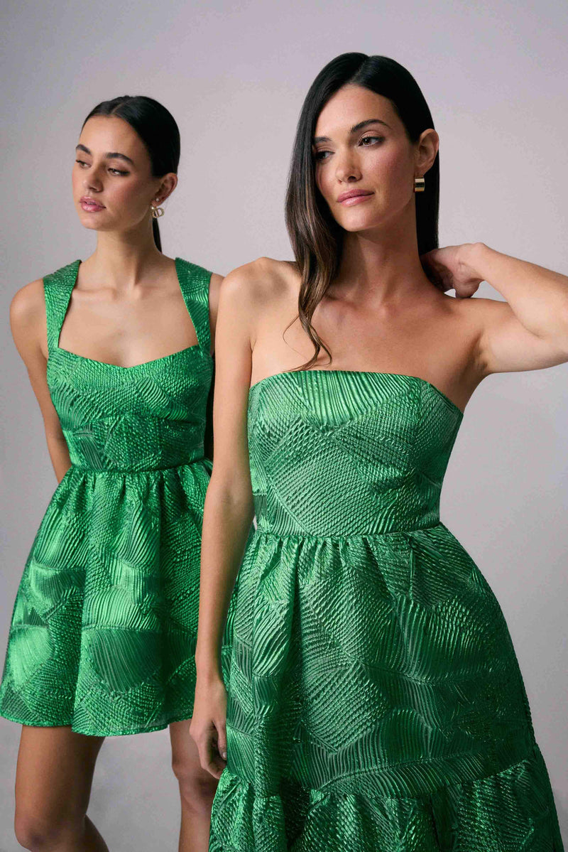 Brunette model wearing Ginnifer Strapless Maxi Dress in Green campaign shot