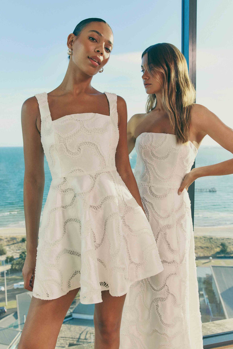 Elara Beaded Mini Dress in White | Timeless Elegance & Flared Style Elliatt Elara Beaded Mini Dress in White | Timeless Elegance & Flared Style Elliatt