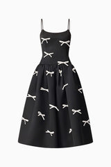 Brunette model wearing Ursula A-Line Midi Dress in Black ghost shot