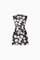 Brunette model wearing the Carol Tulip Mini Dres in Black & White ghost shot
