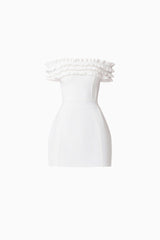 Brunette model wearing Sonya Off The Shoulder Mini Dress in White ghost shot