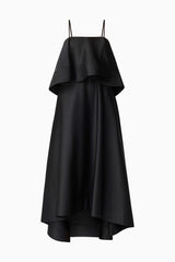 Brunette model wearing Reyna Tiered Maxi Dress in Black ghost shot