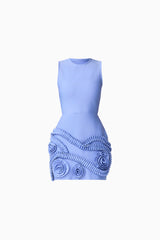Brunette model wearing Sonya Tulip Mini Dress in Blue ghost shot