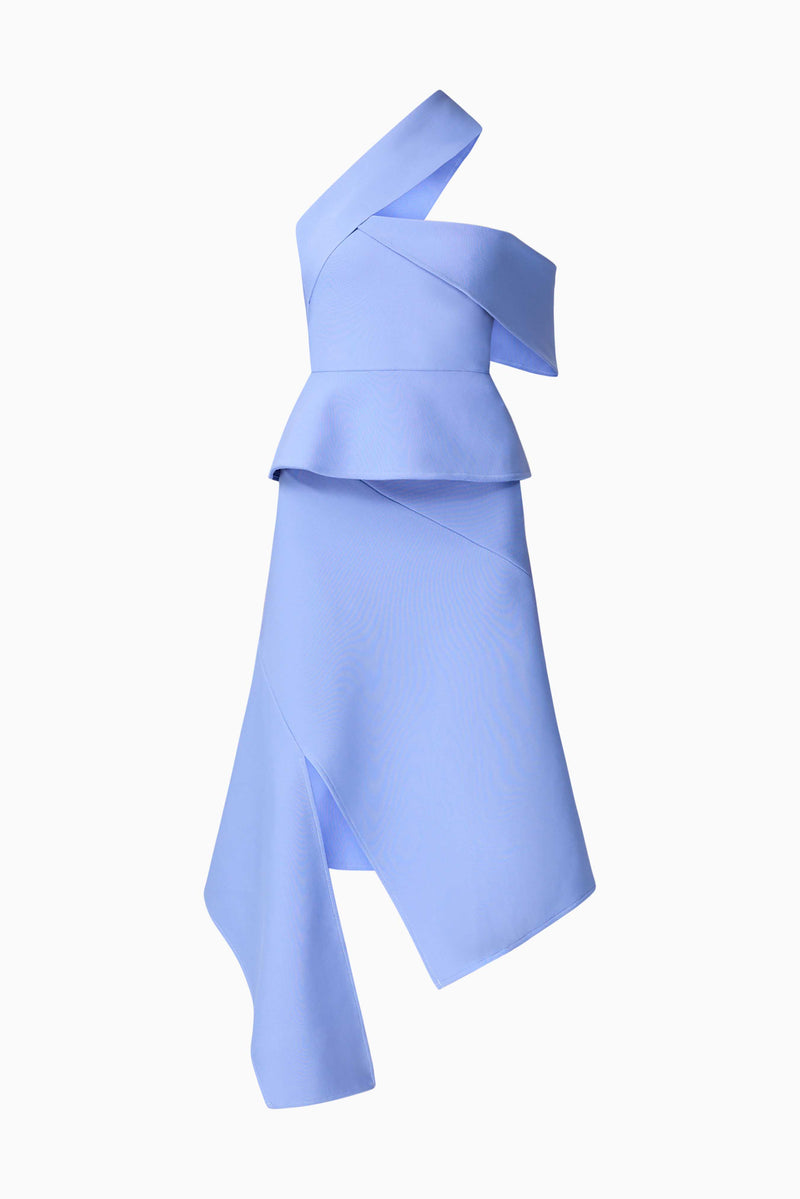 Brunette model wearing Sonya Asymmetrical Set in Blue ghost shot