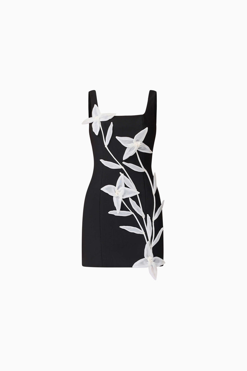 Brunette model wearing ILARIA MINI DRESS in black ghost shot