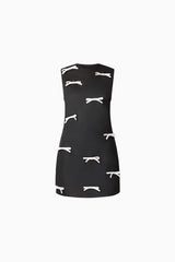 Brunette model wearing Ursula Mini Shift Dress in Black ghost shot