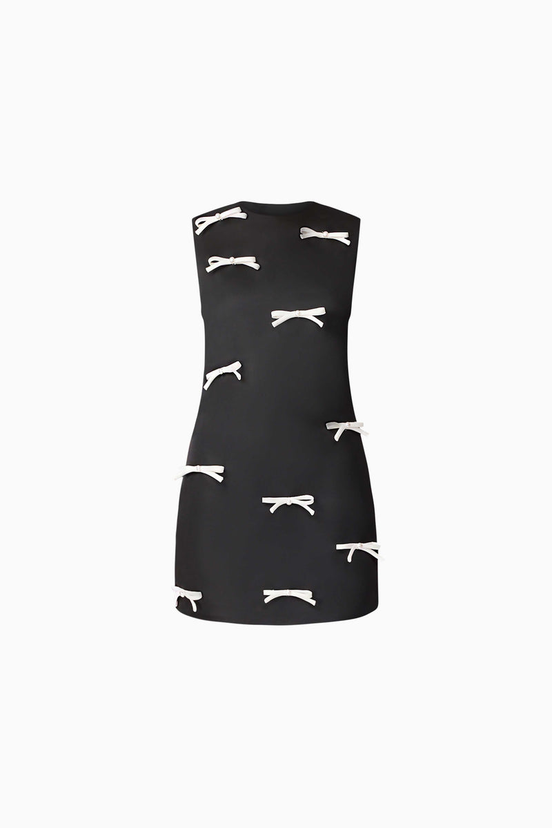 Brunette model wearing Ursula Mini Shift Dress in Black ghost shot