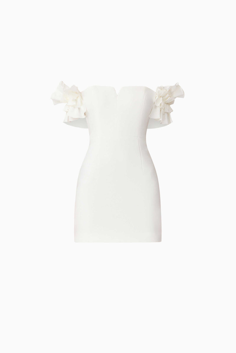 Brunette model wearing Nola Off The Shoulder Mini Dress in White ghost shot