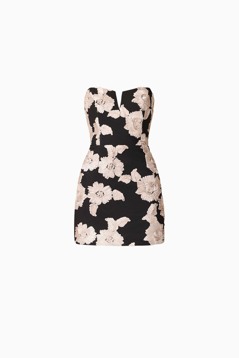 Brunette model wearing Margaux Strapless Mini Dress in Black & Gold Floral  ghost shot