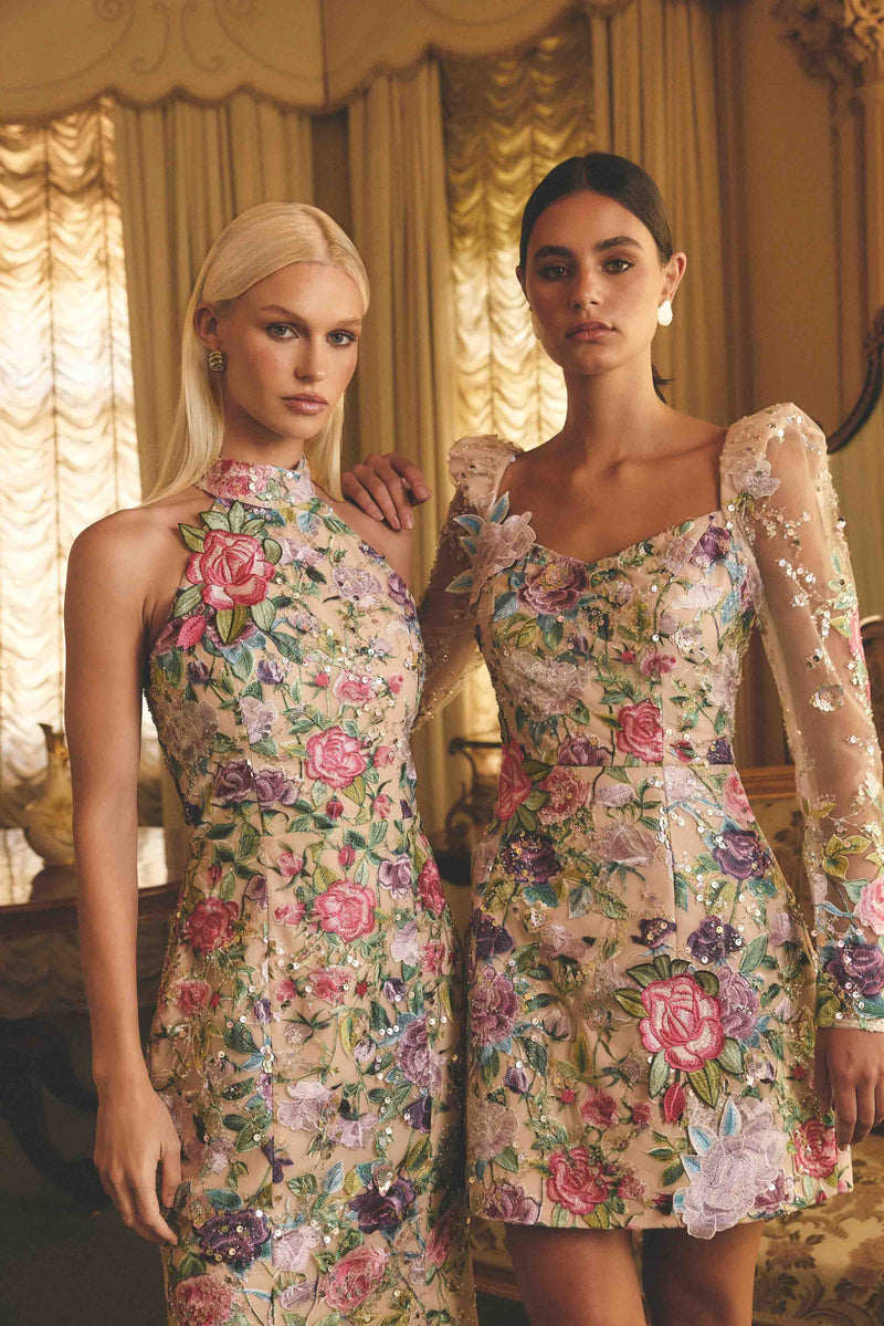 Brunette model wearing Eliska Long Sleeve Mini Dress in Floral campaign shot