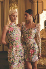 Blonde model wearing Eliska Halter Neck Gown in Floral campaign shot