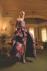 Blonde model wearing Delphine Strapless Gown in Pink & Black Floral campaign shot