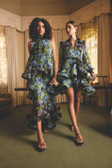 Brunette model wearing Briony Long Sleeve Mini Dress in Black Floral campaign shot