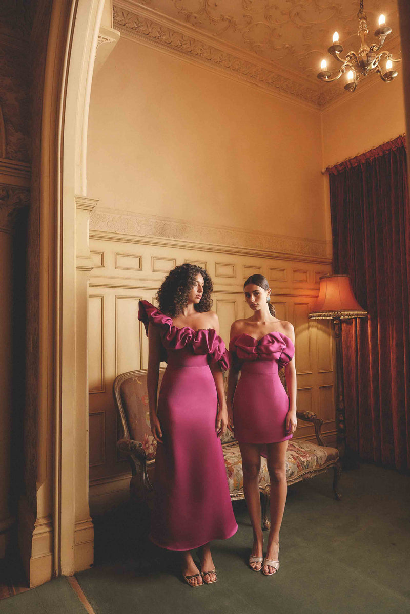 Brunette model wearing Sharon Strapless Mini Dress in Purple campaign shot