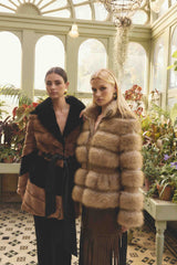 Brunette model wearing Aisling Faux Fur & Leather Jacket in Beige campaign Shot