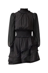 Brunette model wearing the Moss Long Sleeve Mini Dress in Black ghost shot
