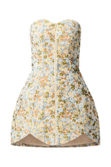 Brunette model wearing Tasmin Strapless Mini Dress in Blue & Yellow Floral ghost shot 