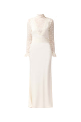 Brunette model wearing the Margot Long Sleeve Gown in White ghost shot