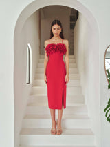Brunette model wearing the Lila Fitted Midi Dress in Red close up campaign shot