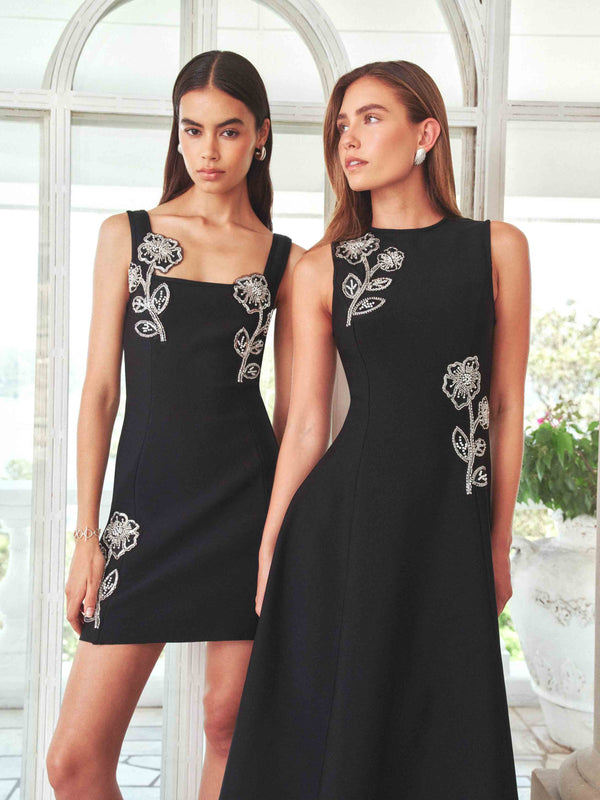 Brunette model wearing the Soleil A-Line Midi Dress in Black Campaign Shot