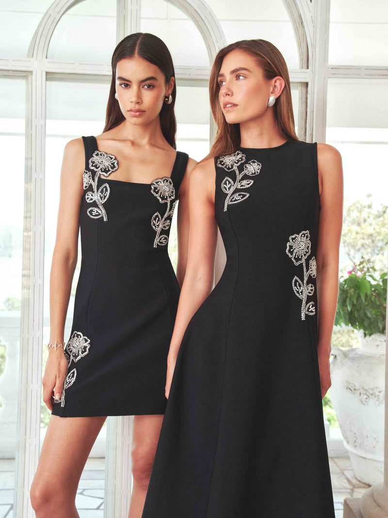 Brunette model wearing the Soleil A-Line Midi Dress in Black Campaign Shot