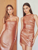 Brunette model wearing the Rhian Fitted Mini Dress in Orange campaign Shot