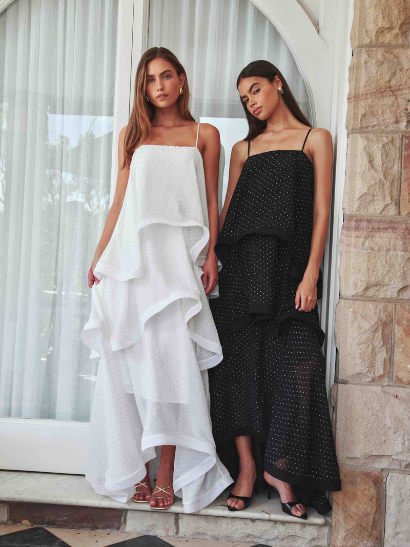 Brunette model wearing Moss Tiered Gown in White campaign shot