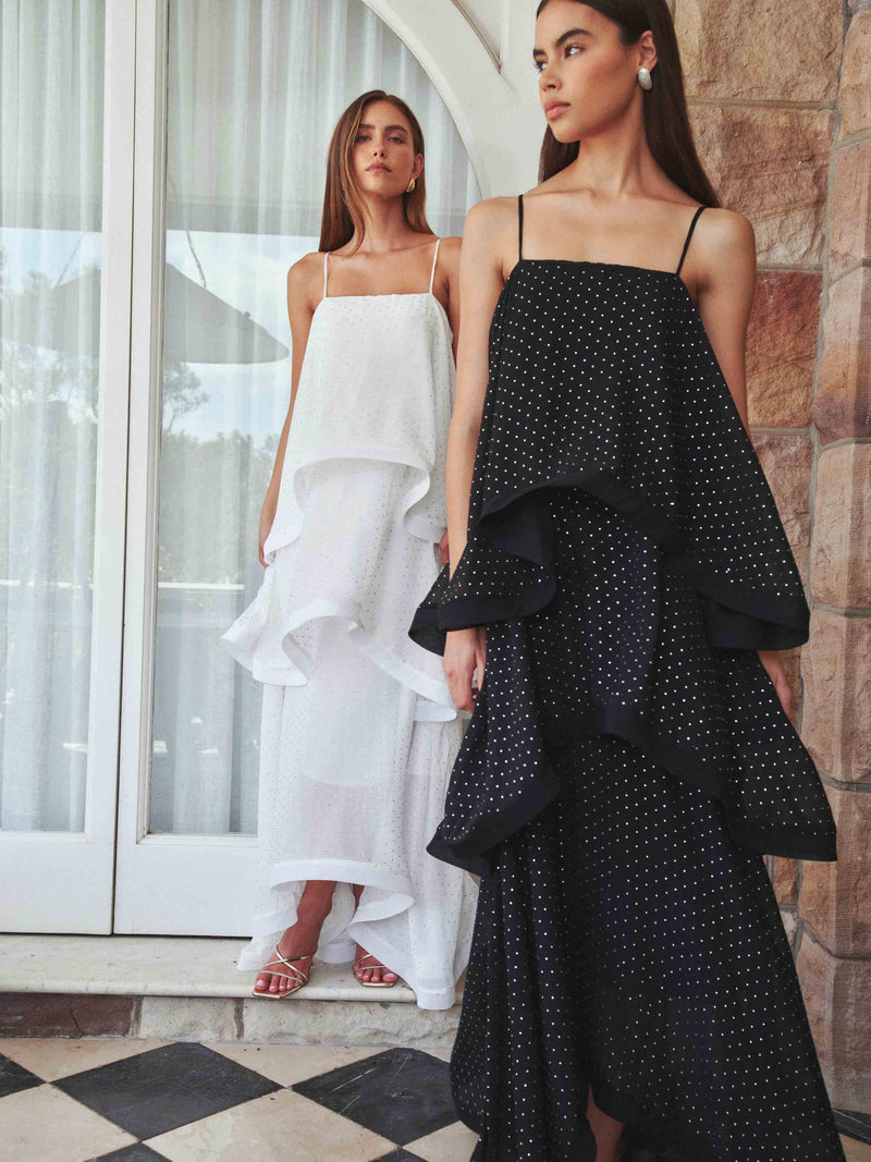 Brunette model wearing Moss Tiered Gown in Black campaign shot