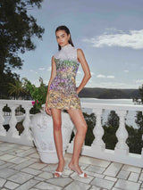 Brunette model wearing the Arden Shift Mini Dress in Multi Ombre campaign shot