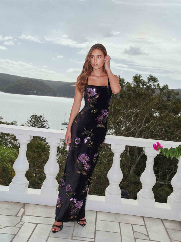 Brunette model wearing the Clio Sequin Gown in Black campaign shot
