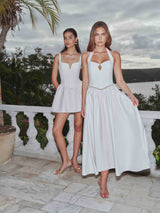 Brunette model wearing the Hester Halter Gown in White campaign shot