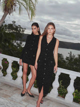 Brunette model wearing the Blythe Knit Set in Black campaign shot