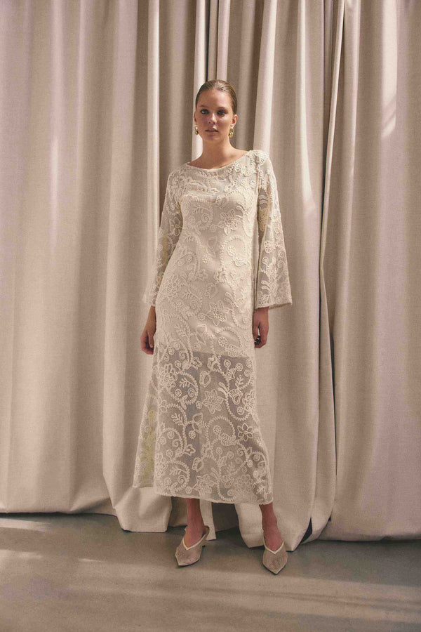 Brunette model wearing Valentine Long Sleeve Maxi Dress in Beige campaign shot