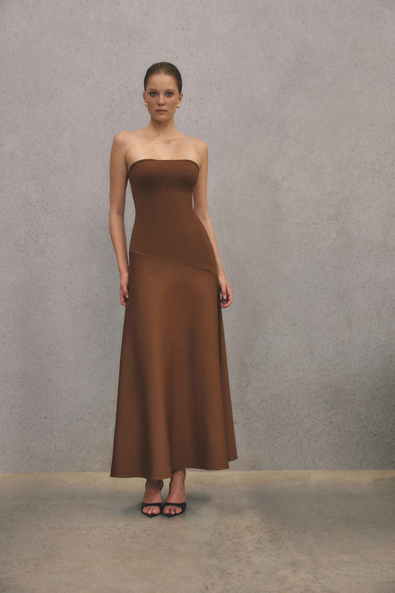 Blonde model wearing CURAAE Zahara Strapless Maxi Dress in Brown campaign shot