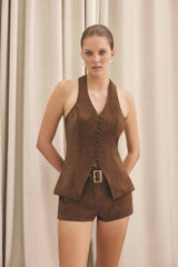 Blonde model wearing CURAAE Venus Suede Set in Brown campaign shot