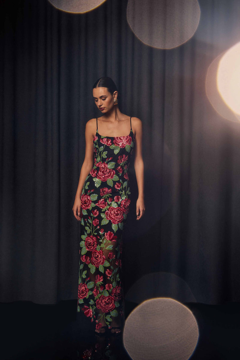 Brunette mode wearing the Lyra Sequin Gown in Pink & Green Floral campaign shot 