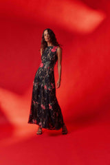 Brunette model wearing the Morgaine Lace Gown in Black campaign shot
