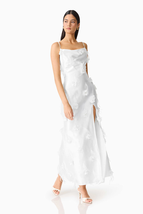 Model wearing Lunaria Satin Maxi Dress In White side shot