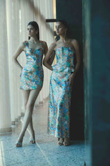 Brunette model wearing the Athea Gown in Floral campaign shot