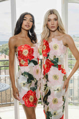 Brunette model wearing the Solara Strapless Mini Dress in Pink Floral campaign shot 2