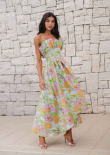 Brunette female model wears the Laurel Sleeveless Maxi Dress in Green Floral