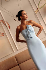 Brunette model wearing Ami Strapless Midi Dress in Blue posed campaign shot