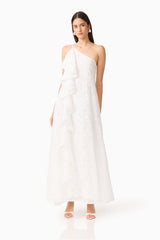 CURAAE Elen Ruffle Maxi Dress in White with ruffle detailing and asymmetric neckline posed shot