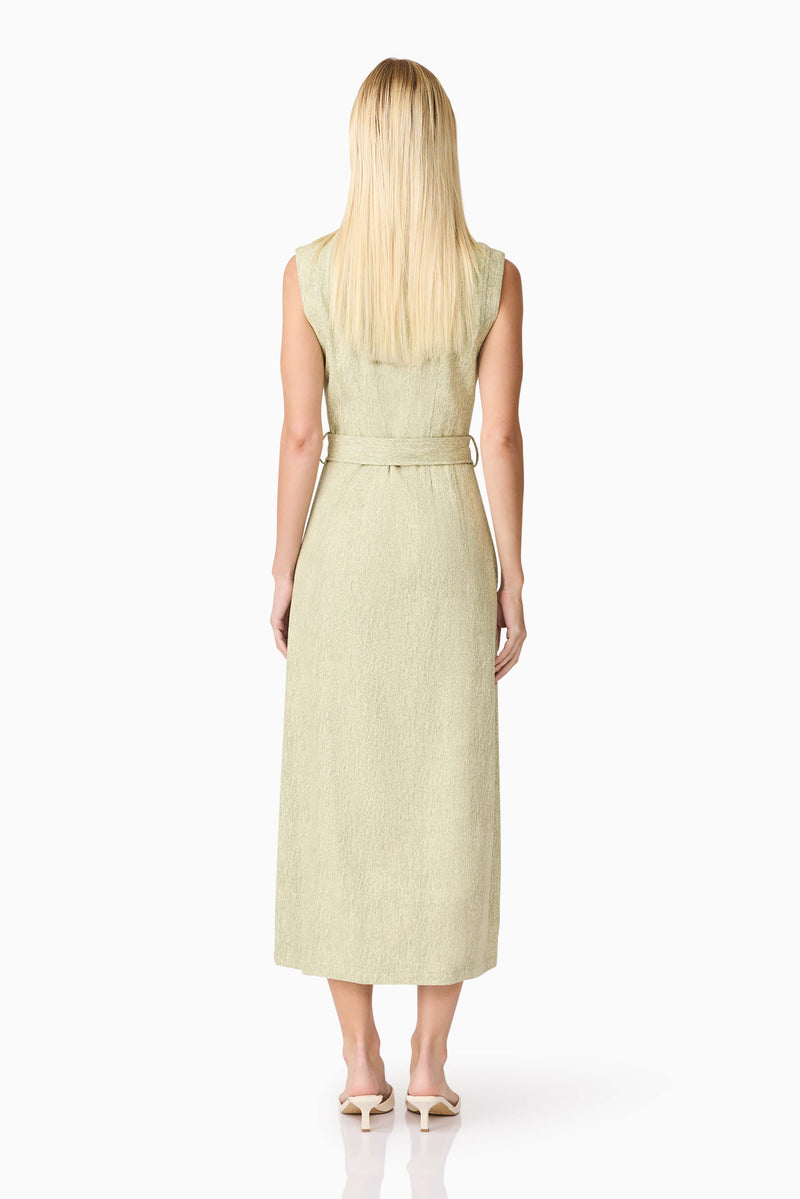 Blonde model wearing CURAAE Gretal Midi Dress in Green back shot