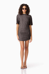 Brunette model wearing CURAAE Lavania Short Sleeve Mini Dress in Grey posed shot