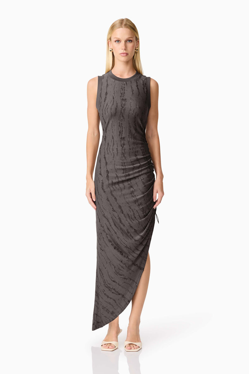 Blonde model wearing CURAAE Lavania Asymmetrical Midi Dress in Grey front shot