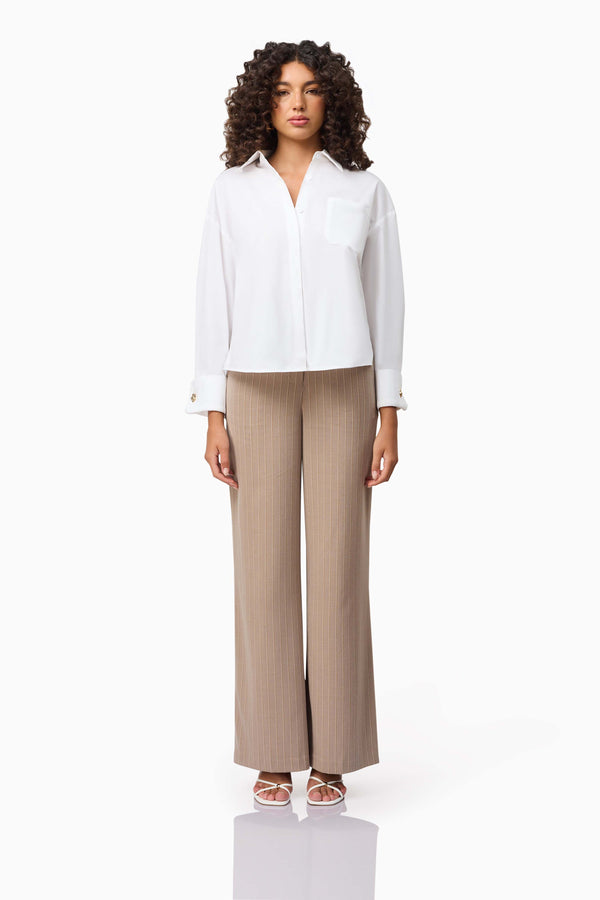 Brunette model wearing the Belle Shirt in White front shot