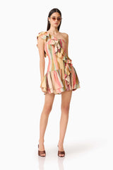 CURAAE Zala Ruffle Mini Dress in Striped Multi with ruffles and sunglasses posed shot