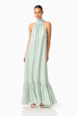 CURAAE Isaline Halter Maxi Dress in Sage Green with relaxed silhouette posed shot